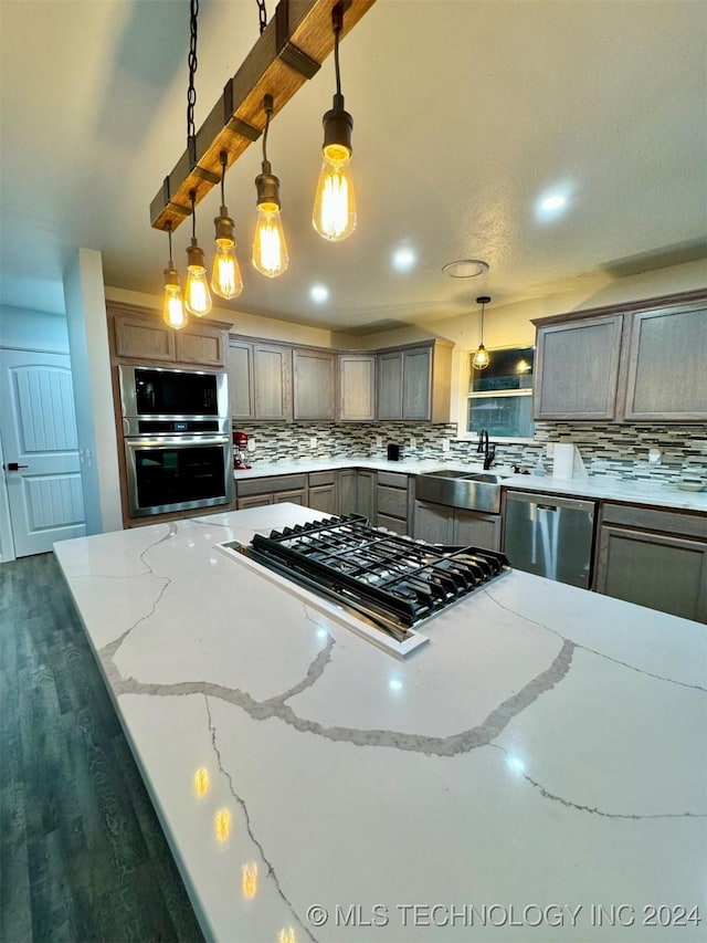 114399 Oak Rd, Eufaula, OK 74432 - kitchen with tasteful backsplash, gray cabinetry, stainless steel appliances, and a sink