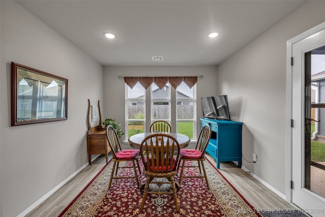 dining room featuring light hardwood / wood-style flooring