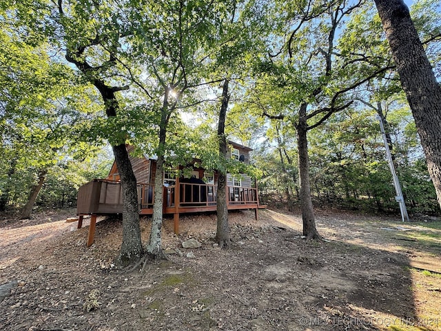 view of yard featuring a deck