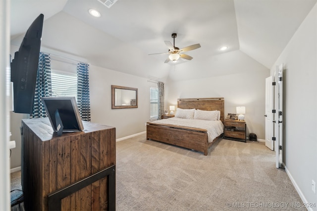 carpeted bedroom featuring vaulted ceiling and ceiling fan