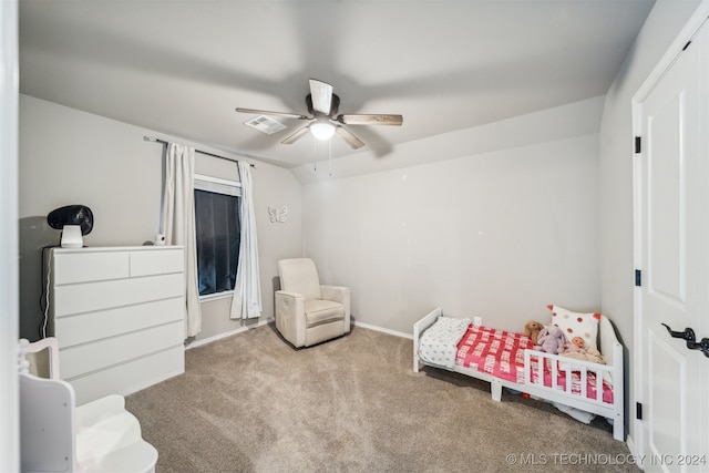 bedroom with ceiling fan, lofted ceiling, and light carpet