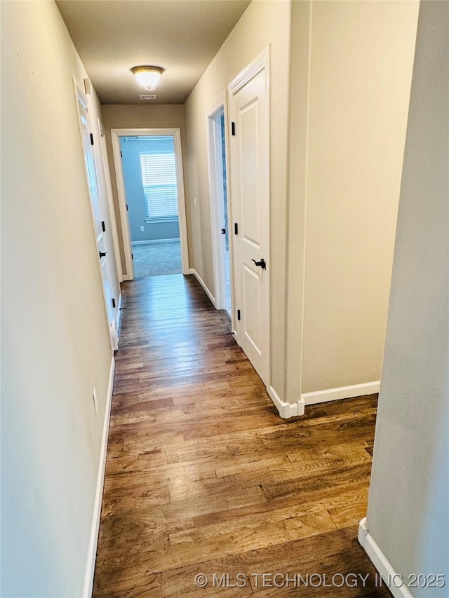 hall featuring hardwood / wood-style floors