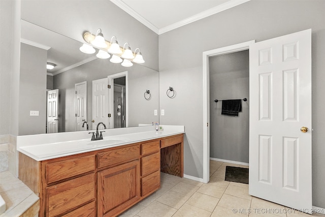 bathroom featuring vanity, crown molding, and tile patterned flooring