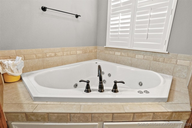 bathroom featuring a tub to relax in