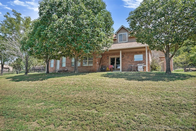 view of front of home with a front lawn