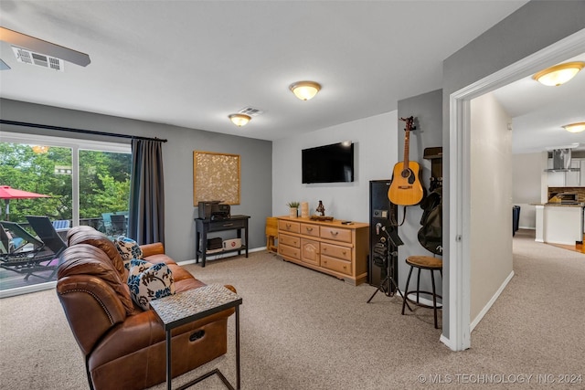 living room featuring light colored carpet