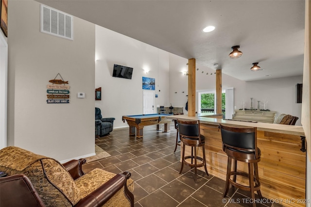 rec room with dark tile patterned floors and pool table