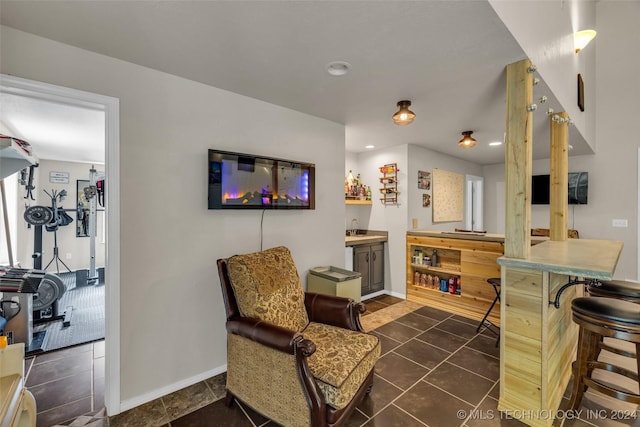 interior space with dark tile patterned floors