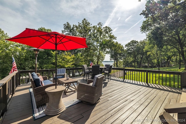 wooden deck with a yard