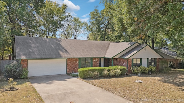 single story home featuring a garage