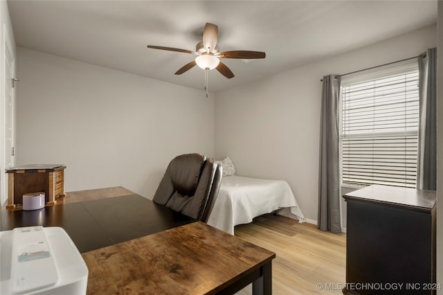 bedroom featuring ceiling fan and light hardwood / wood-style floors