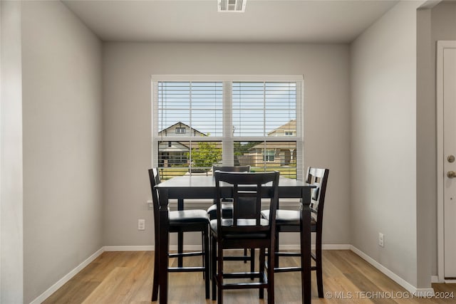 dining room featuring light hardwood / wood-style floors