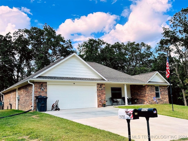 ranch-style house with a front lawn and a garage