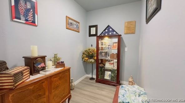 hall featuring light wood-type flooring