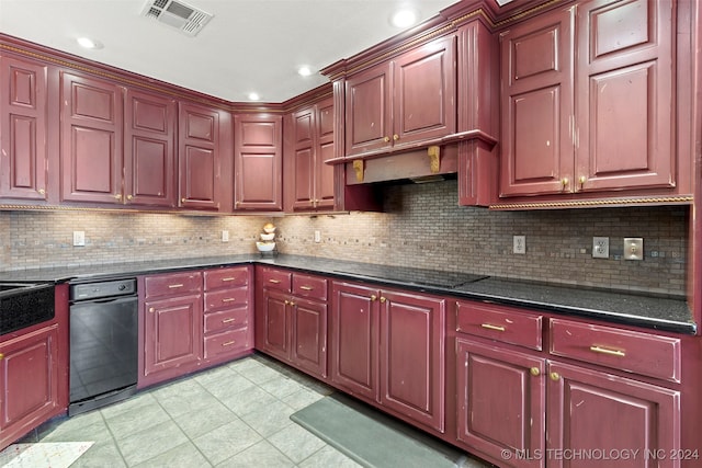 kitchen featuring dark stone counters, tasteful backsplash, black electric cooktop, and light tile patterned flooring