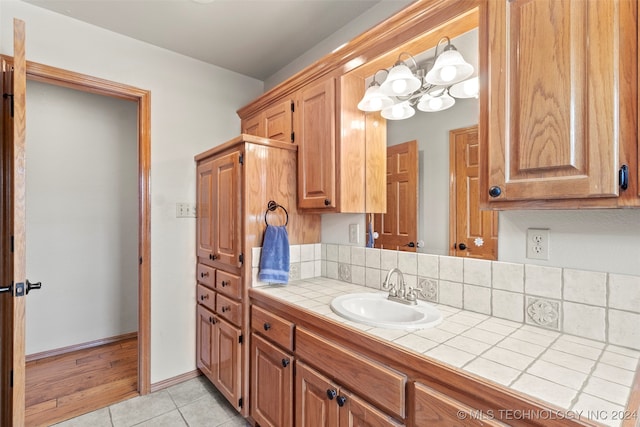 bathroom featuring vanity and hardwood / wood-style flooring