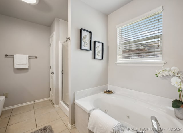 bathroom featuring tile patterned flooring and plus walk in shower