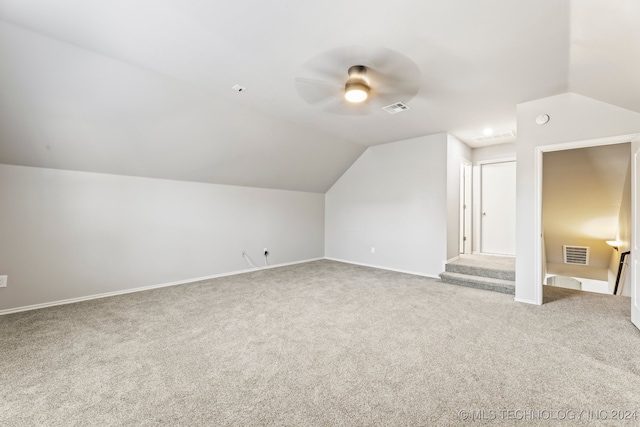 bonus room featuring carpet, ceiling fan, and vaulted ceiling