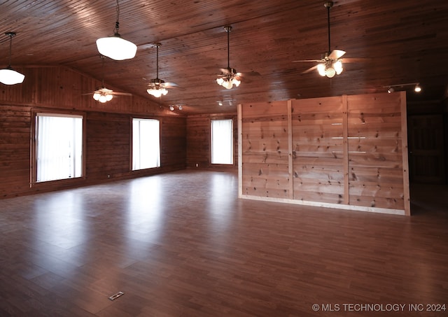 spare room featuring wooden ceiling, plenty of natural light, dark wood-type flooring, and vaulted ceiling