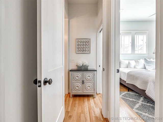 corridor featuring light hardwood / wood-style flooring