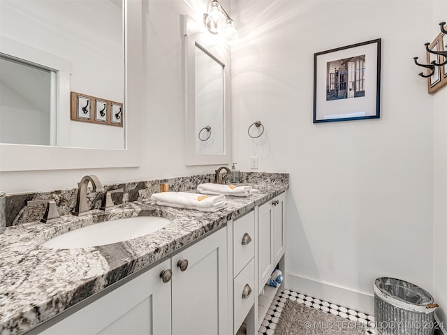 bathroom with vanity and tile patterned floors