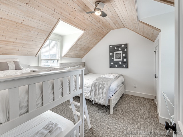 carpeted bedroom featuring ceiling fan, wooden ceiling, and vaulted ceiling