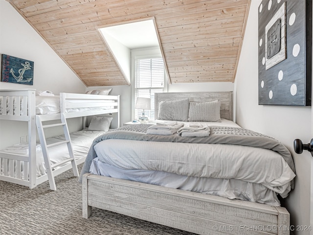 bedroom featuring wooden ceiling, lofted ceiling, and carpet floors