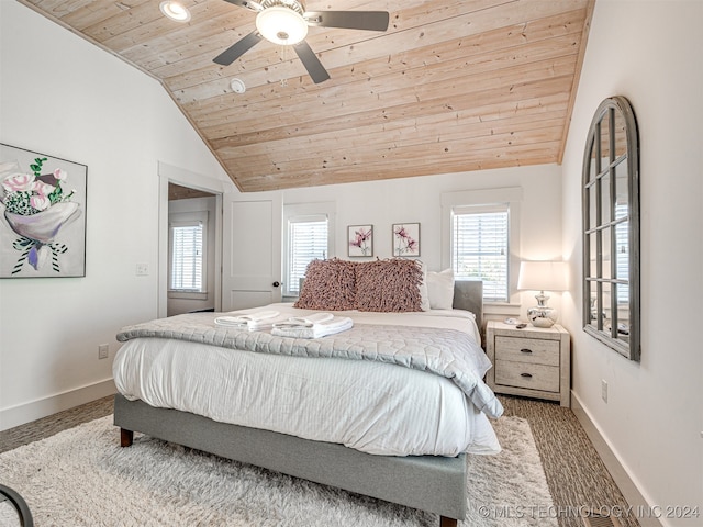 bedroom with wood ceiling, vaulted ceiling, and ceiling fan