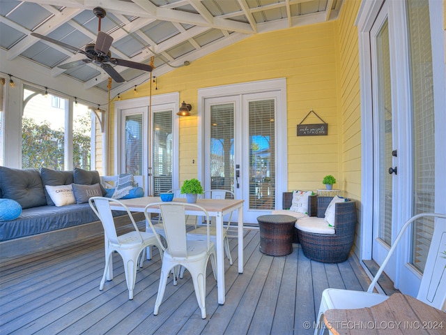 deck with ceiling fan and french doors