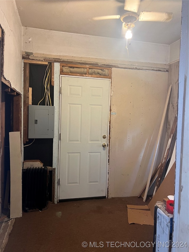 interior space featuring electric panel and ceiling fan