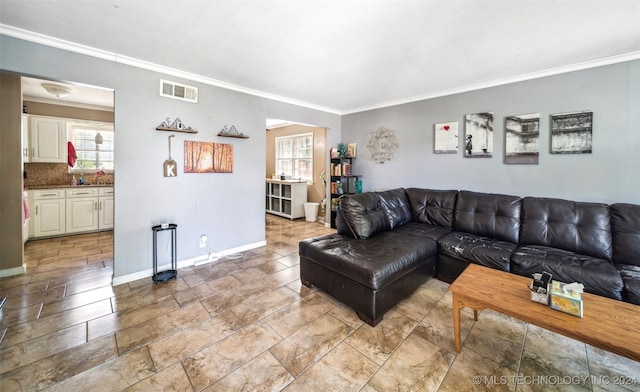 tiled living room featuring crown molding