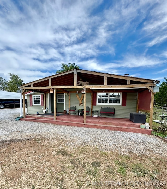 view of front of property featuring a deck