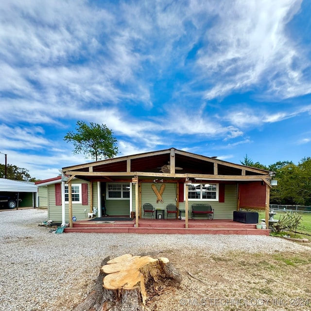 single story home with a porch