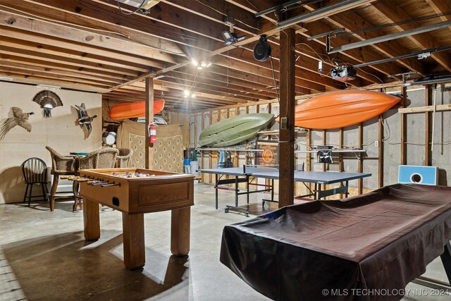 playroom featuring concrete floors and pool table