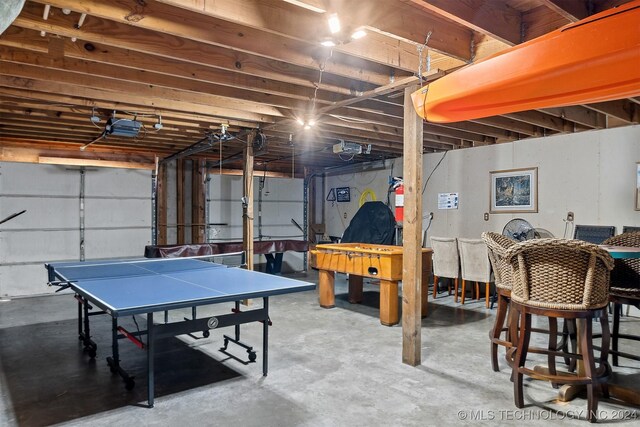 game room with concrete floors