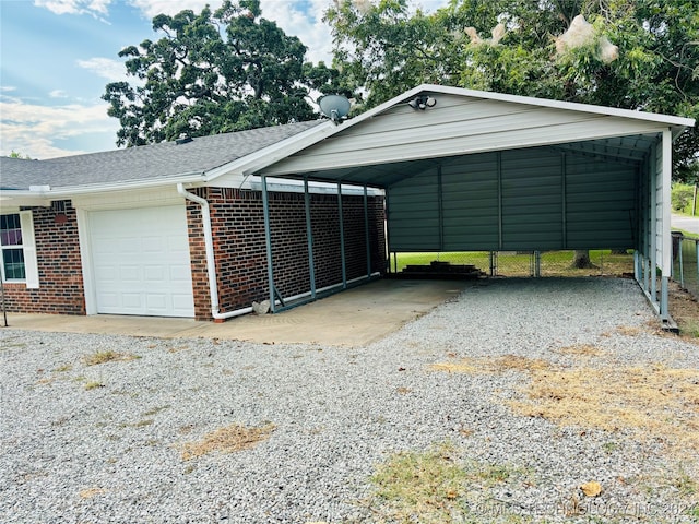 garage with a carport