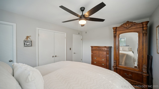 bedroom featuring ceiling fan and a closet