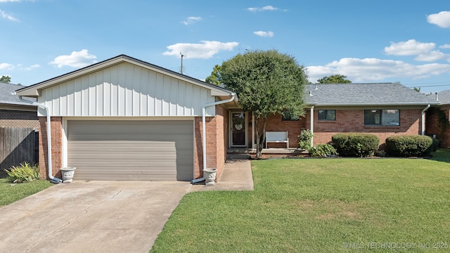 single story home with a garage and a front yard