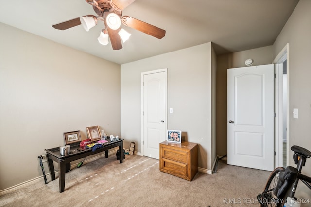 interior space featuring ceiling fan