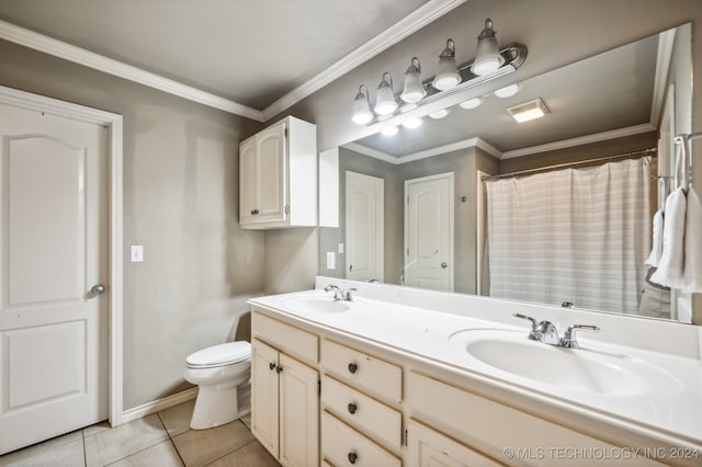 bathroom featuring ornamental molding, vanity, toilet, and tile patterned floors