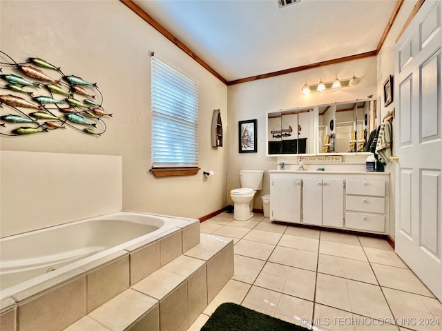 bathroom featuring toilet, tile patterned floors, ornamental molding, vanity, and a relaxing tiled tub