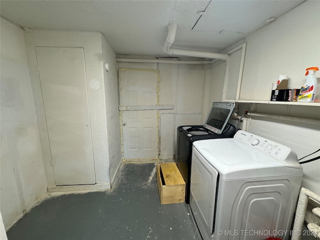 laundry area with washer and clothes dryer