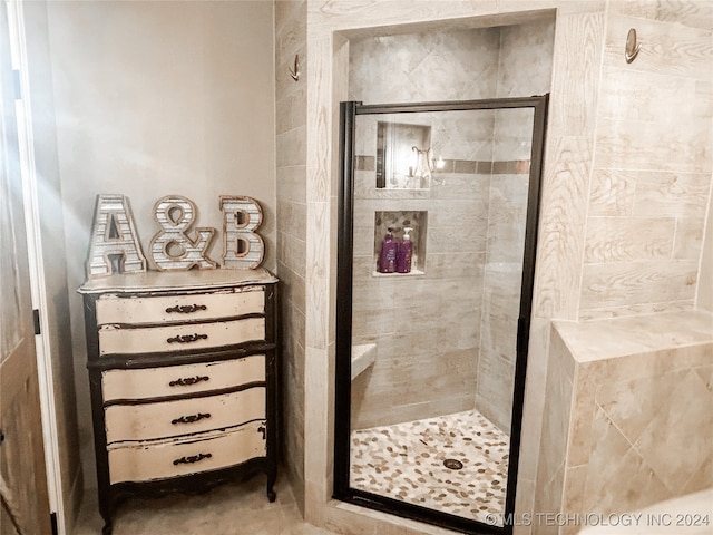 bathroom with an enclosed shower