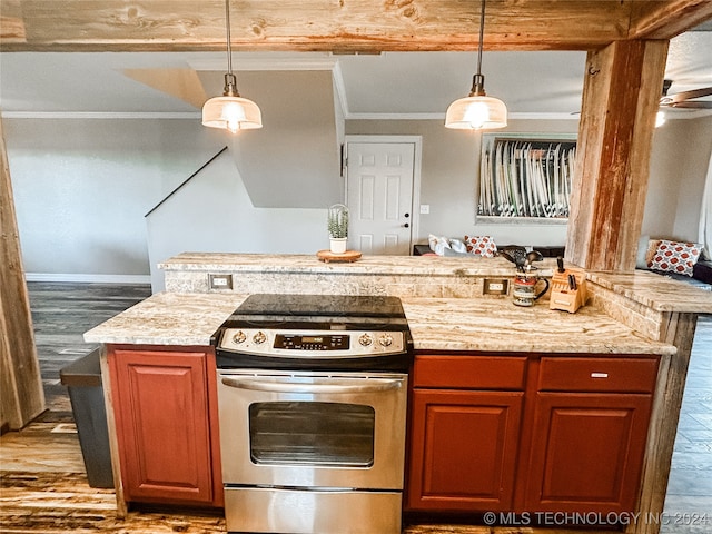 kitchen featuring decorative light fixtures, hardwood / wood-style flooring, light stone counters, and stainless steel range with electric cooktop