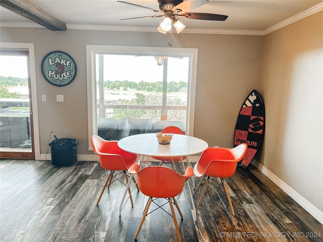 dining space featuring crown molding, dark hardwood / wood-style flooring, and ceiling fan