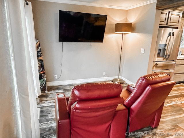 living room with ornamental molding and wood-type flooring