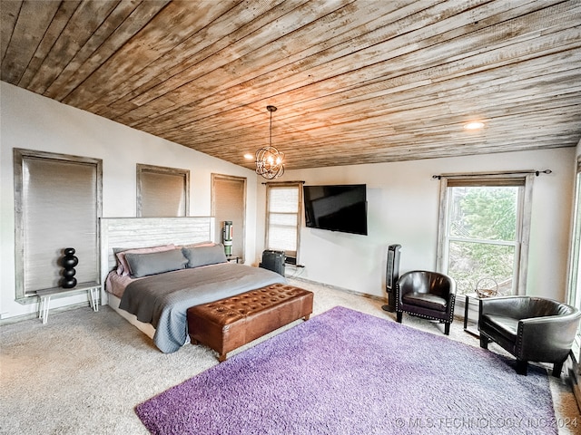 bedroom featuring wood ceiling, an inviting chandelier, carpet, and vaulted ceiling