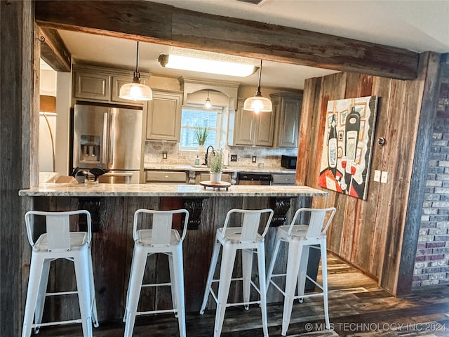 kitchen with tasteful backsplash, hanging light fixtures, stainless steel fridge with ice dispenser, dark wood-type flooring, and beam ceiling