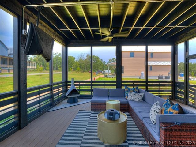 46 Redbud St, Carlton Landing, OK 74432 - sunroom featuring an outdoor living space and a ceiling fan