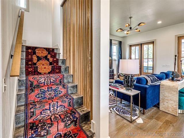 46 Redbud St, Carlton Landing, OK 74432 - staircase with wood finished floors, recessed lighting, and a chandelier